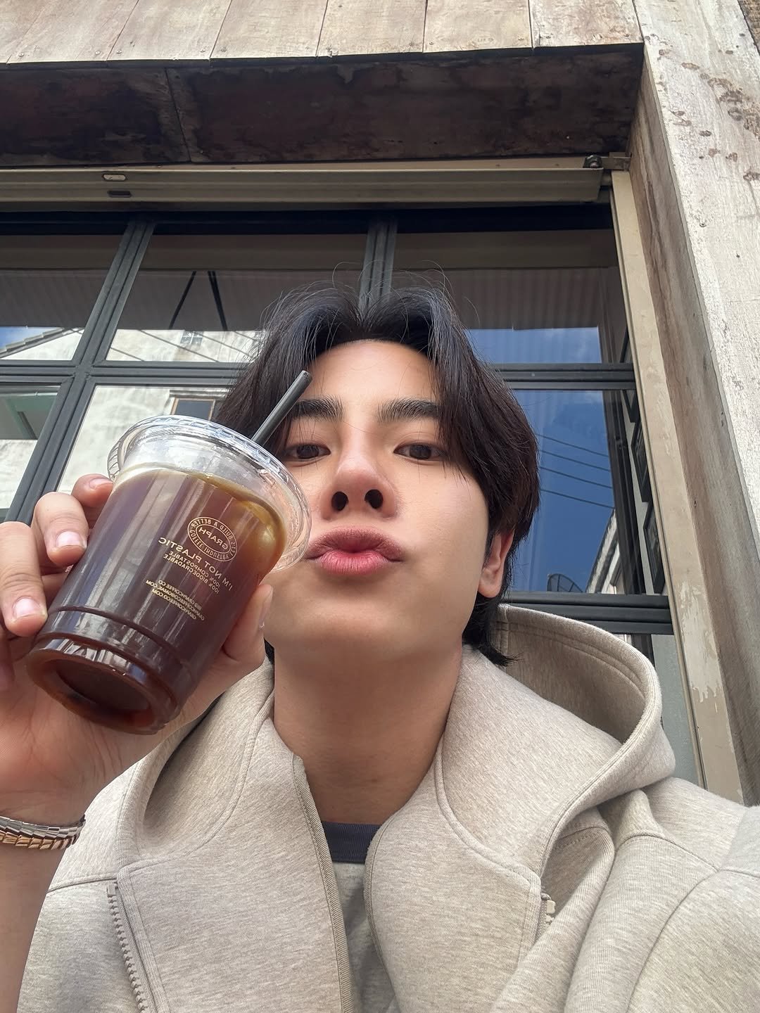 Photo by Mixxiw on January 20, 2026. May be an image of duffle coat, drink, cornflower and text.