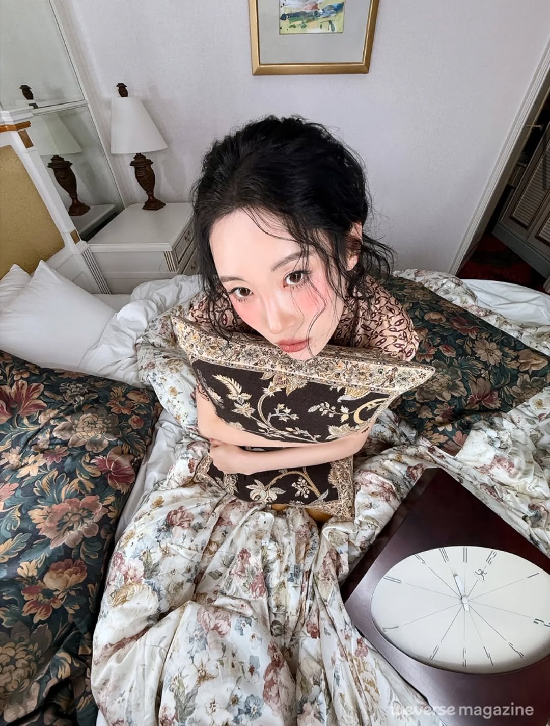 Photo shared by SUNMI on January 20, 2026 tagging @narangchoi, and @weverseofficial. May be an image of sleepwear, bed, bedroom and text that says 'evesemagazine oase magazine'.