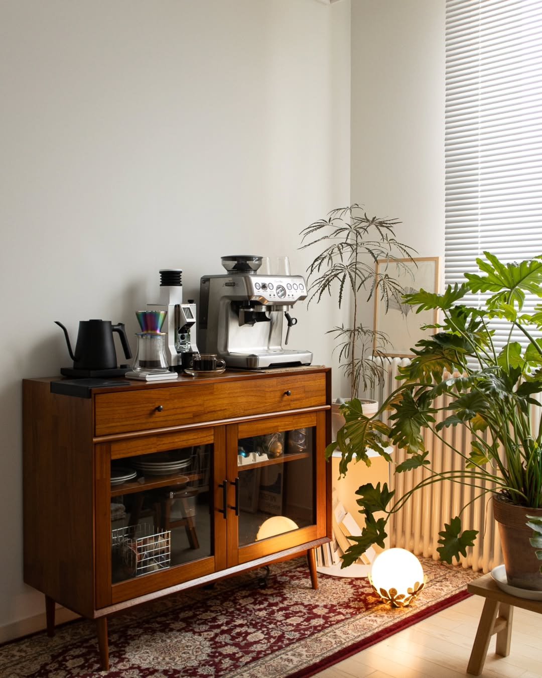 Photo shared by Megan | 메건's home on August 13, 2025 tagging @ikeakr, @otwo_furniture, and @icilamaison. May be an image of credenza, desk, coffee maker, bureau, house plant, kitchen appliance, indoors and text.