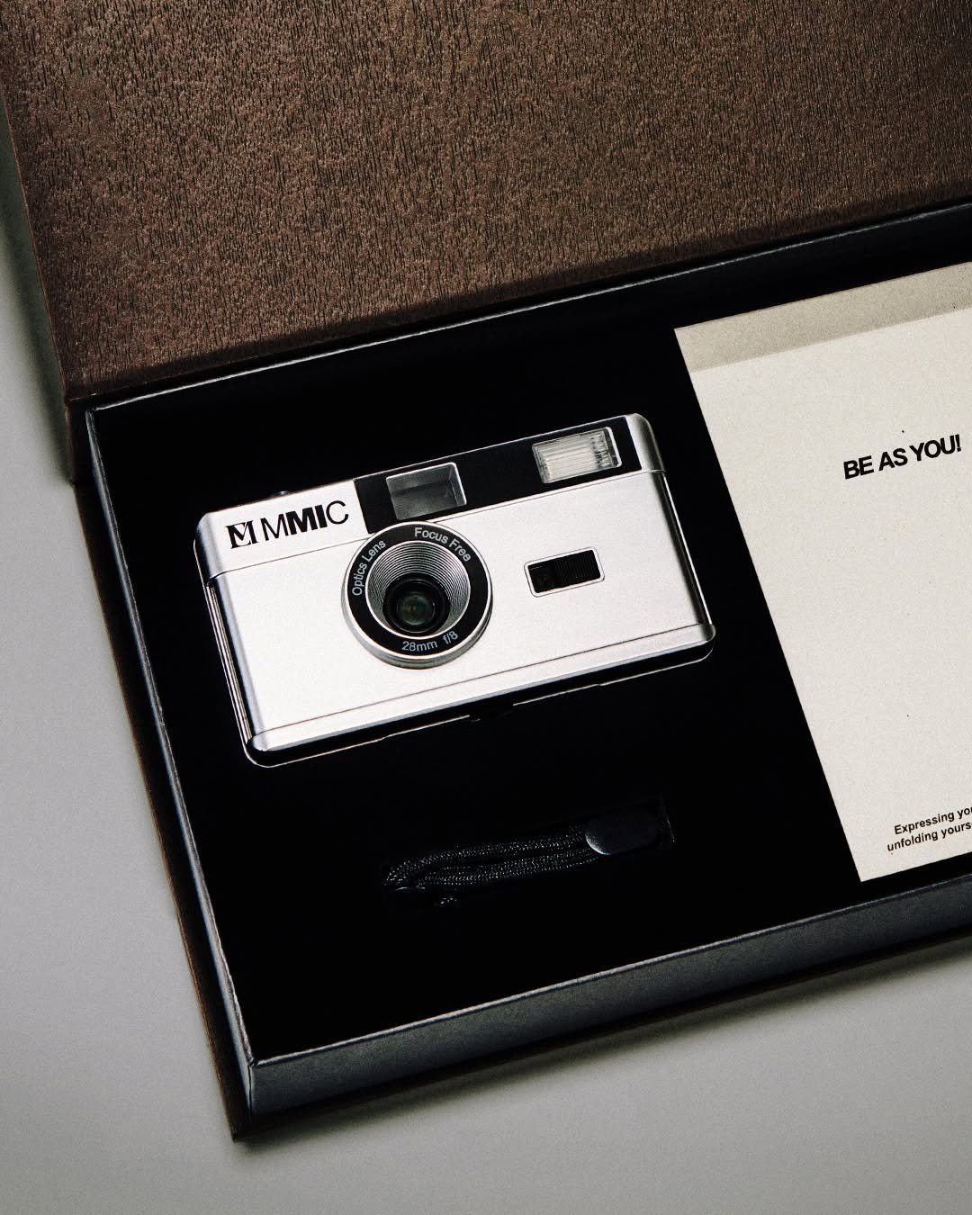 Photo by MMIC (엠엠아이씨) on April 14, 2026. May be an image of portable cassette player, camera and text that says 'M M I MΙΣ Focus BE BEASYOU! AS YOU! Expressing unfalding'.