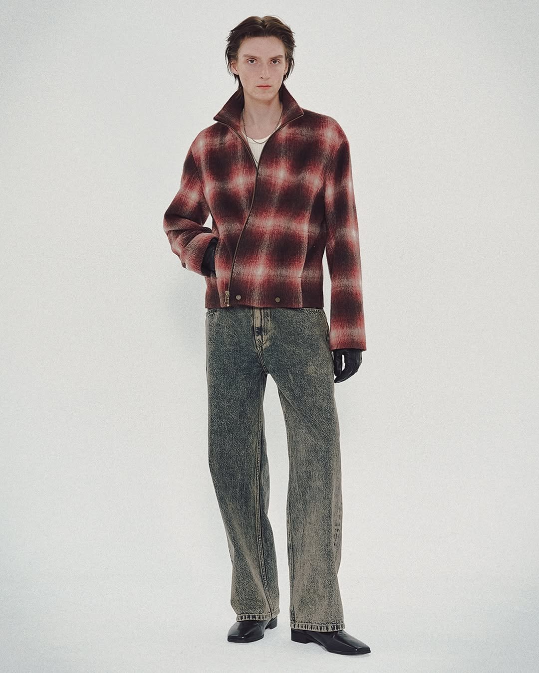 Photo by MMIC (엠엠아이씨) on October 26, 2025. May be an image of duffle coat, overcoat, turtleneck, flannel and text.