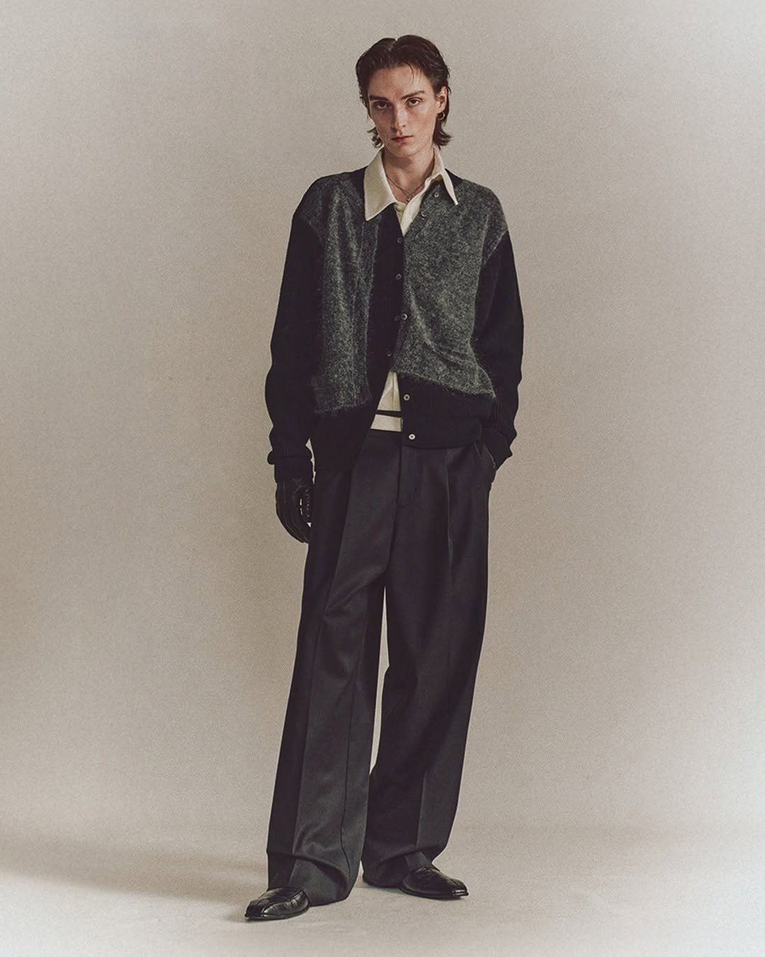 Photo by MMIC (엠엠아이씨) on October 22, 2025. May be an image of overcoat, turtleneck and text.