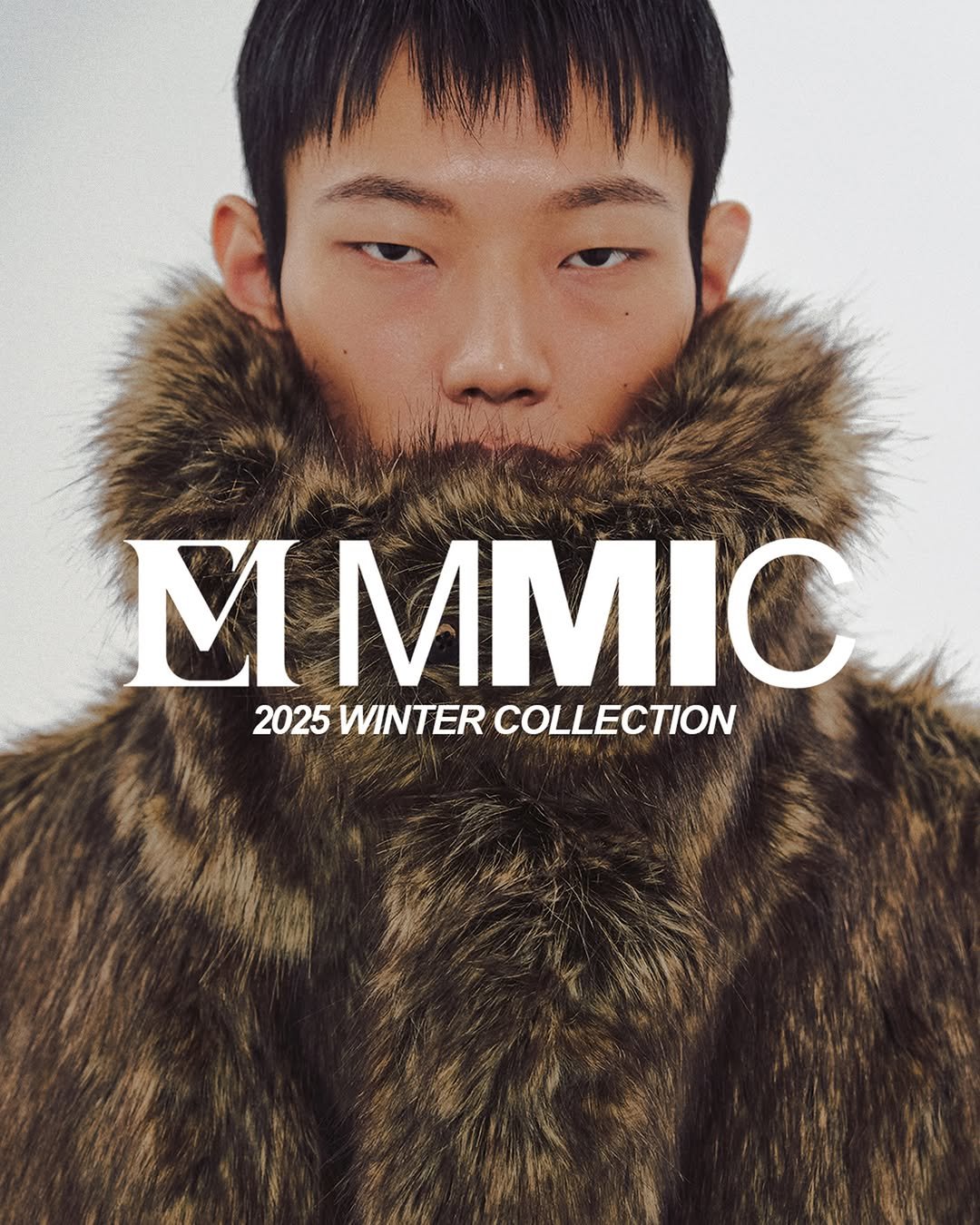 Photo by MMIC (엠엠아이씨) on October 27, 2025. May be an image of overcoat, duffle coat, goosedown coat, sable coat, parka, jacket and text that says 'VIN IMMIC 2025WINTERCOLLECTION 2025 WINTER COLLECTION'.