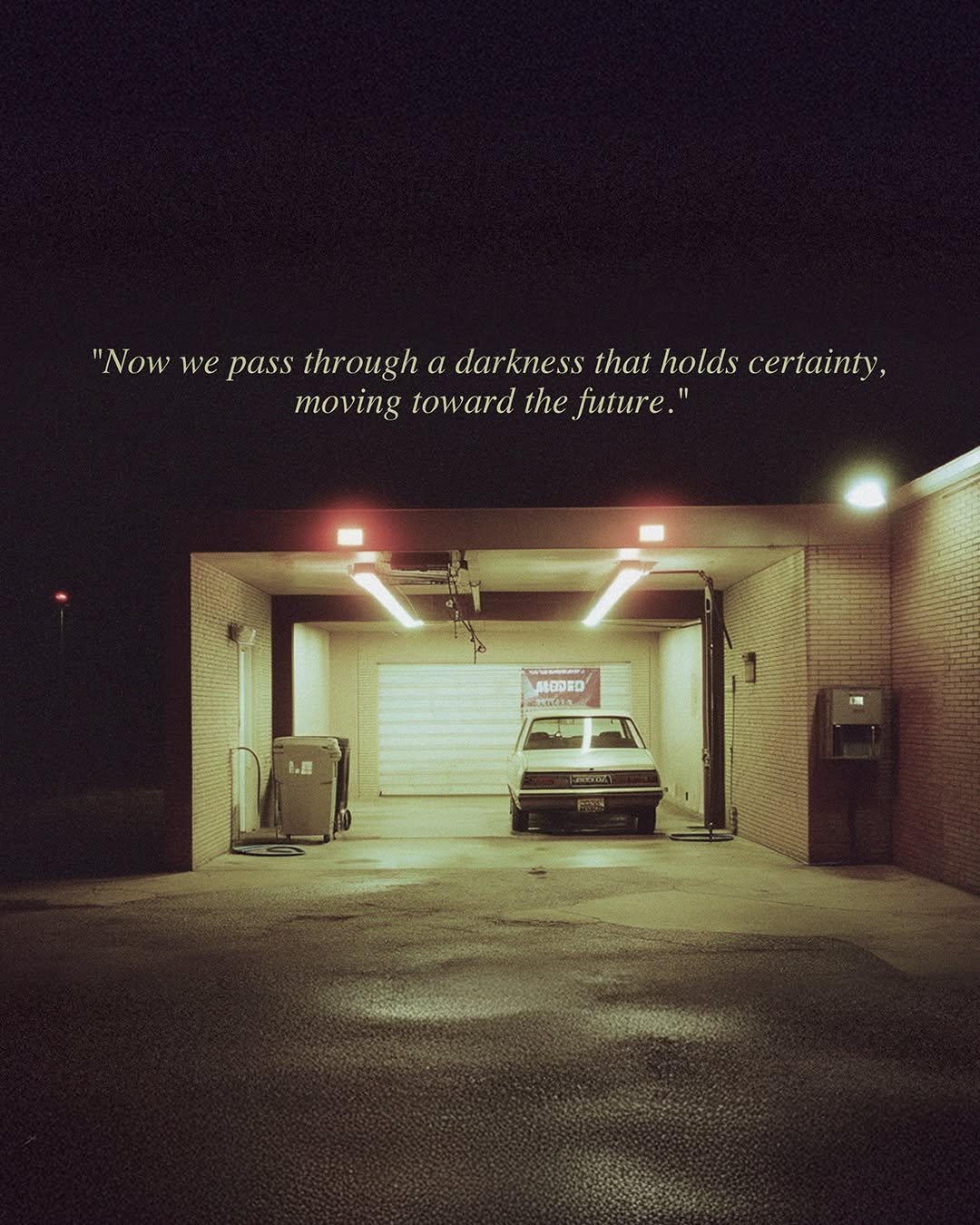 Photo by MMIC (엠엠아이씨) on February 01, 2026. May be an image of street and text that says '"Now we pass through a darkness that holds certainty, moving toward the future." 口0屋込 店0 1.国'.