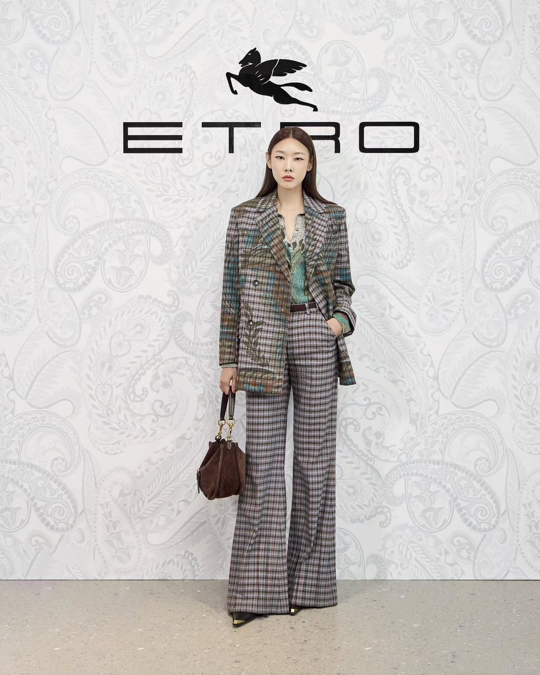 Photo shared by Han Hyejin on August 28, 2025 tagging @etro. May be an image of 1 person, suit, overcoat and text.