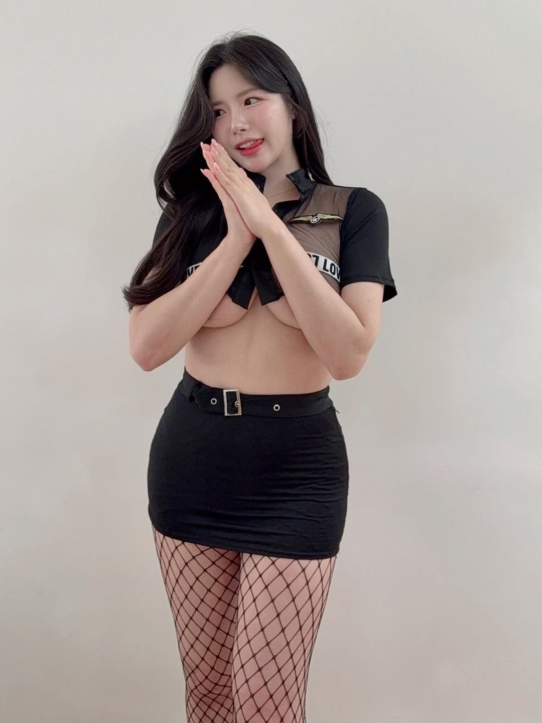 Photo by 모구모구🍑 on August 11, 2025. May be an image of 1 person, hair, fishnet stockings, miniskirt, tights and text.