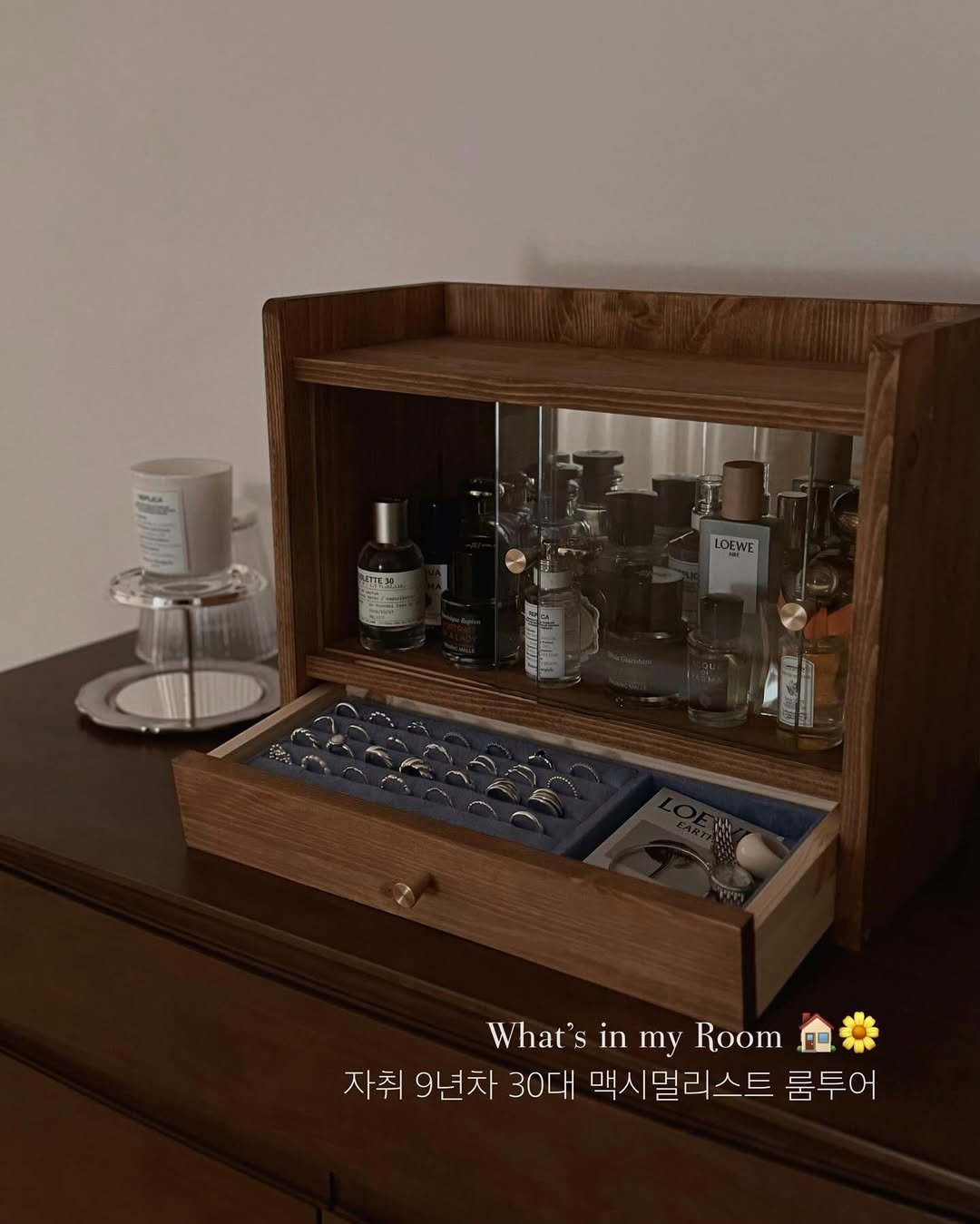 Photo by 말리 on March 13, 2026. May be an image of fragrance, armoire, perfume, rack and text.