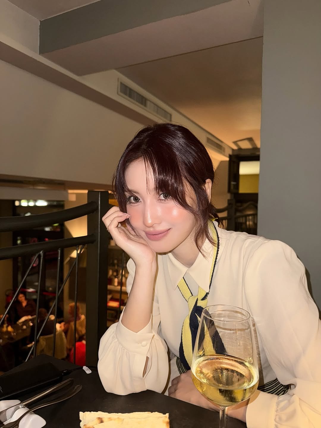 Photo by 모모 (MOMO) on September 27, 2025. May be an image of 1 person, hair, drink and text.