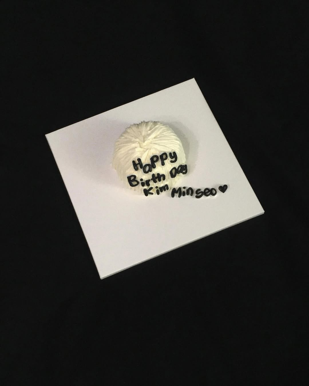 Photo by 민 서 on December 05, 2025. May be an image of cupcake, button, brooch, paper weight and text.