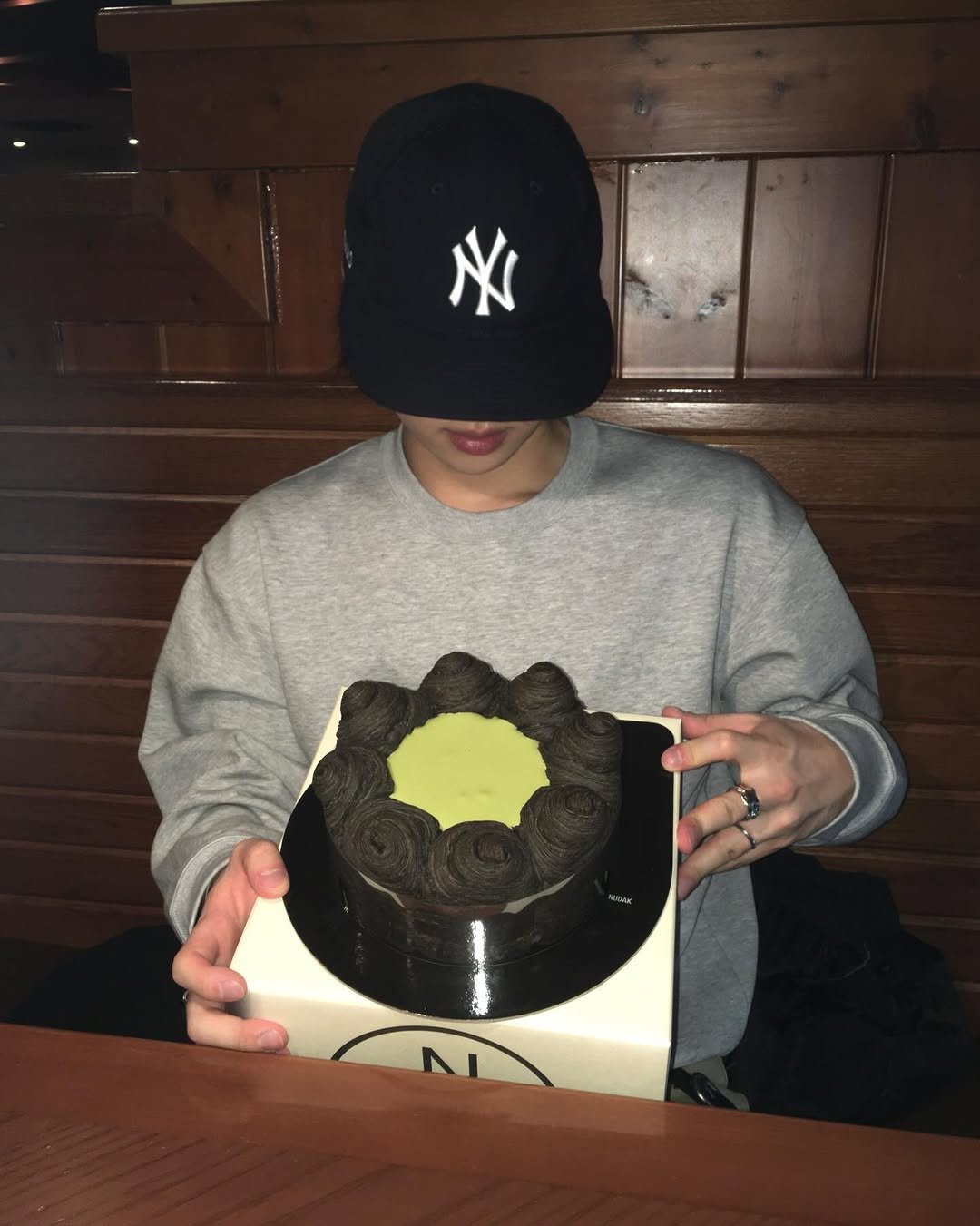 Photo by 민 서 on December 05, 2025. May be an image of hat, chiffon cake, chocolate cake and chocolate mousse.