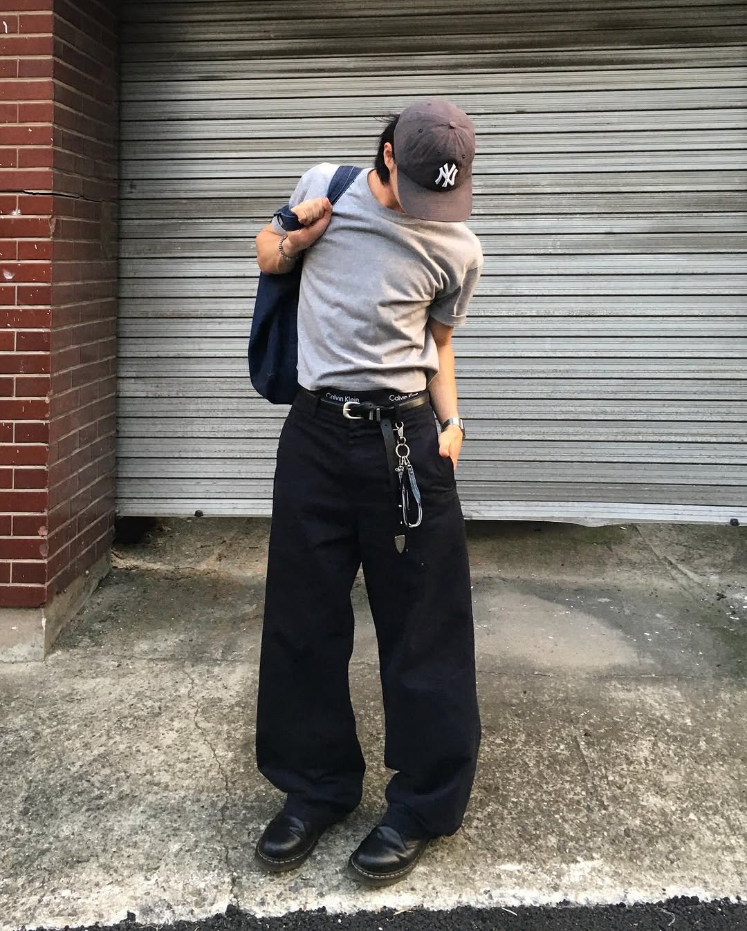 Photo shared by 민 서 on September 02, 2025 tagging @belier_atelier, @fitsonpoint__, @uniformdisplay, @feedxwear, @what.you.wearing, @secrets.jp, @divein.kr, and @ffits4. May be an image of 1 person, tool bag, sling, sweatpants and text.