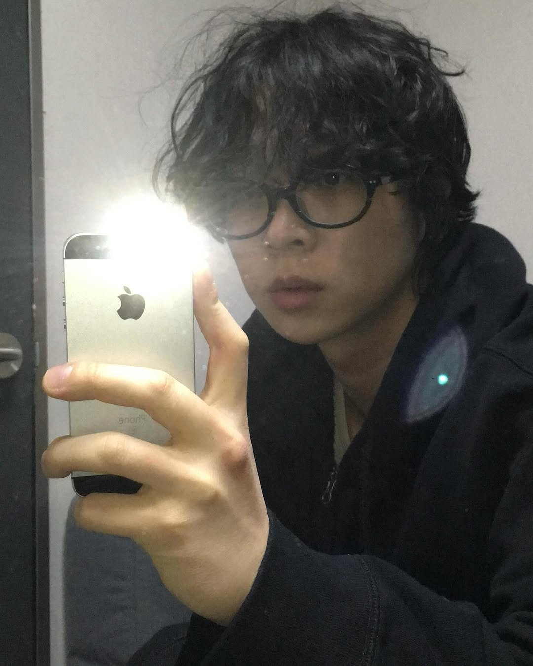 Photo by 민 서 on January 18, 2026. May be a selfie of one or more people, bangs, eyeglasses, mirror, cigarette, bath robe and text.