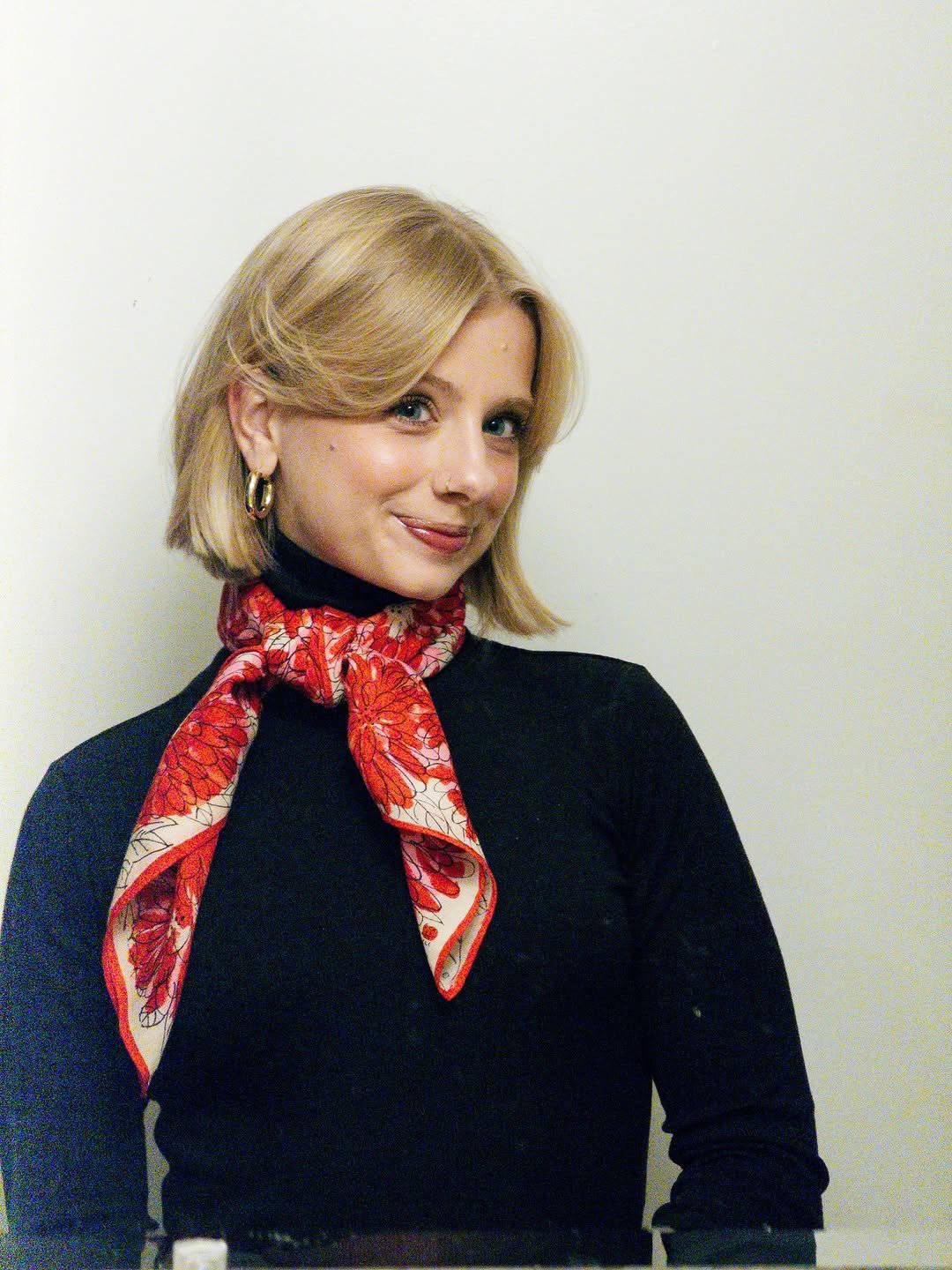 Photo by Oswaldo Cepeda on December 06, 2025. May be an image of scarf, bandanna, headscarf and text.