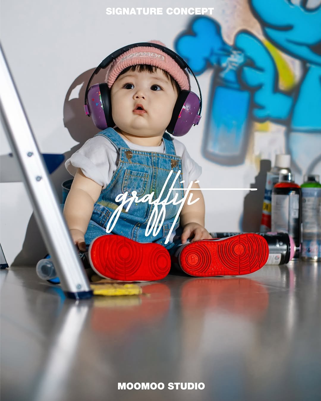 Photo by MOOMOO STUDIO 무무스튜디오 on September 24, 2025. May be an image of 1 person, baby, toy, portable cassette player, diaper, baby shoes, poster and text.