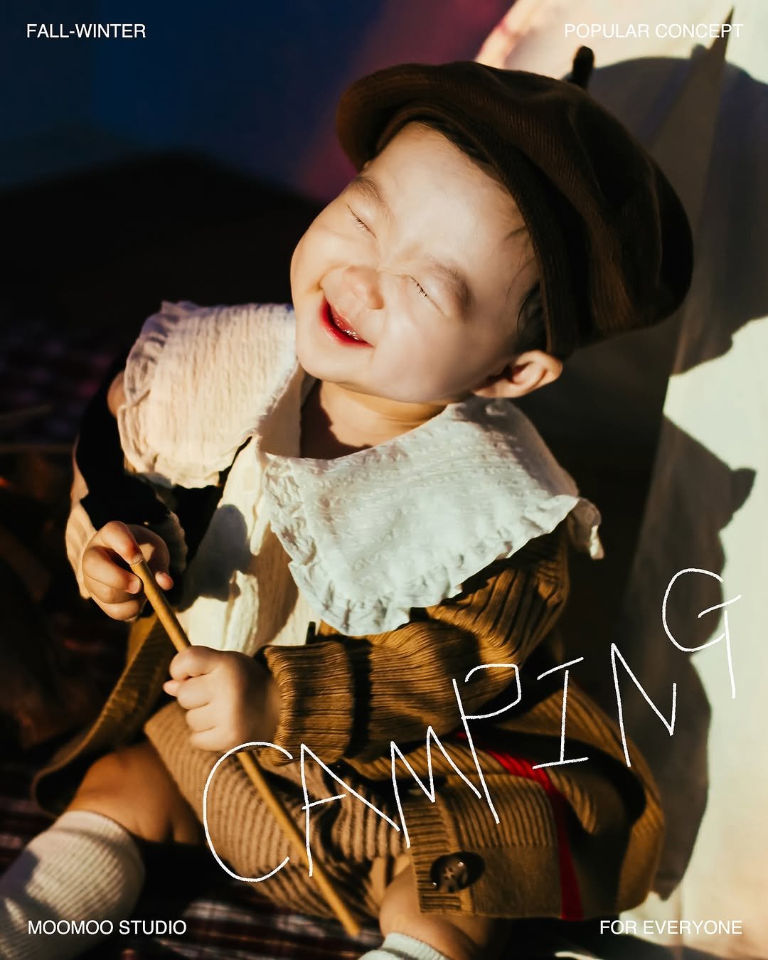 Photo by MOOMOO STUDIO 무무스튜디오 on September 25, 2025. May be an image of 1 person, baby, camping, duffle coat, magazine, tent, outdoors and text that says 'FALL-WINTER POPULAR POPULARCONCEPT CONCEPT MOOMOOSTUDIO MOOMOO STUDIO EN C FOR FOREVERYONE'.