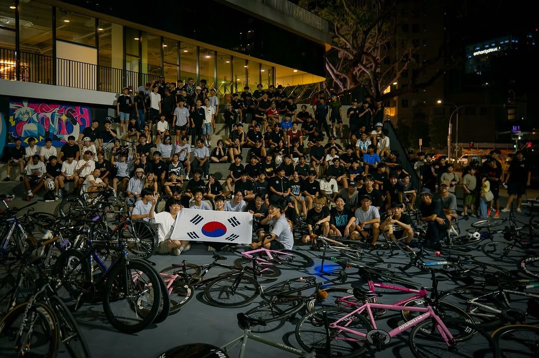 Photo shared by FISHTAIL CYCLERY on July 06, 2025 tagging @scapesg, @tokubetsunamono, @wizerides, @moon_tae_hwan, @libertybikeskl, @subclture, @fixed_industry, @ascentbikes.main, @thenorthworkies, @ardently.official, and @kratozen_official. May be an image of 1 person, bicycle, crowd, street and text.