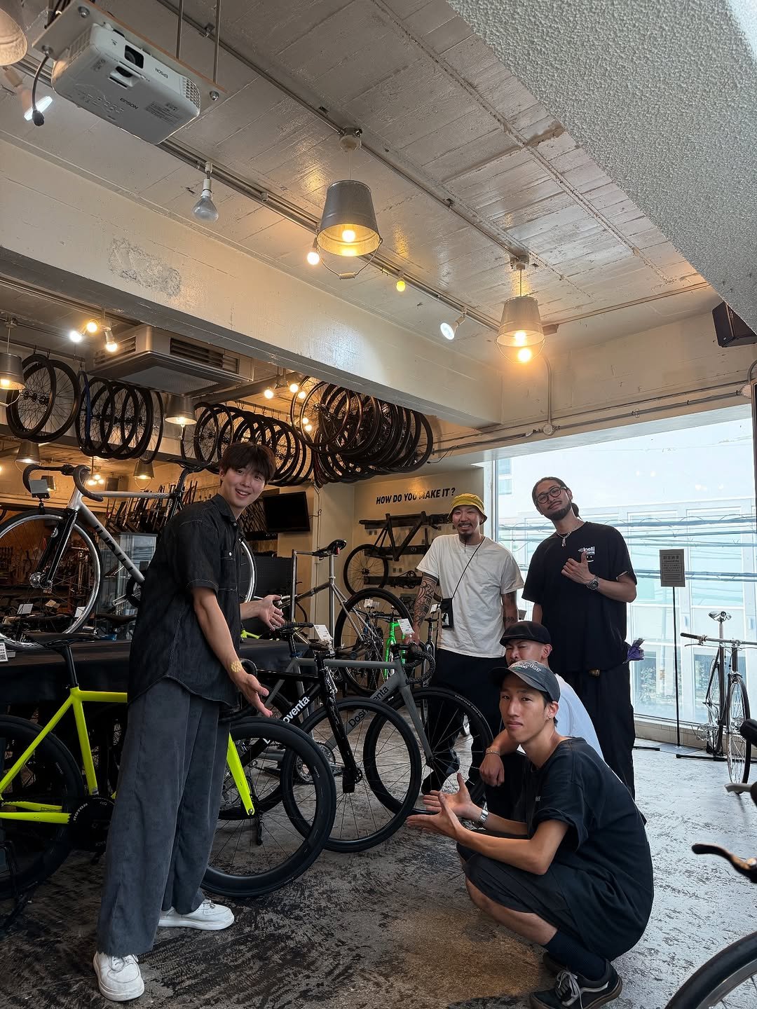 Photo by 문태환 on August 29, 2025. May be an image of 4 people, bicycle, rack, tire and text.