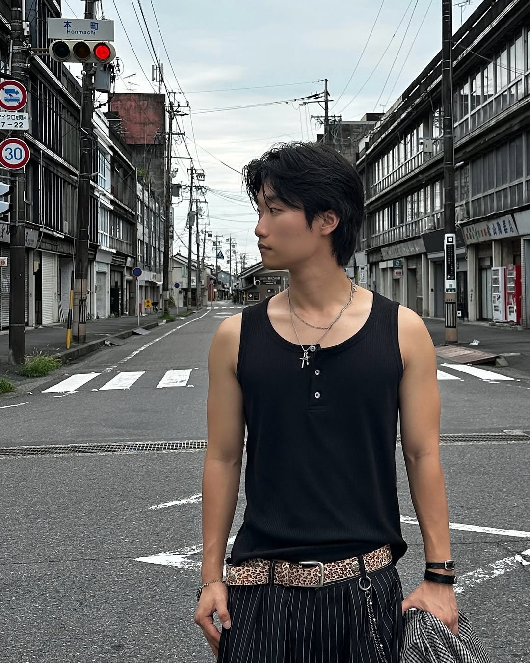 Photo shared by 라오라오 on August 12, 2025 tagging @haleine_official, @hiddenbehind_seoul, and @helet.official. May be an image of 1 person, street, telephone pole and text that says 'Hanmachi イクロを.く -22 30 的'.