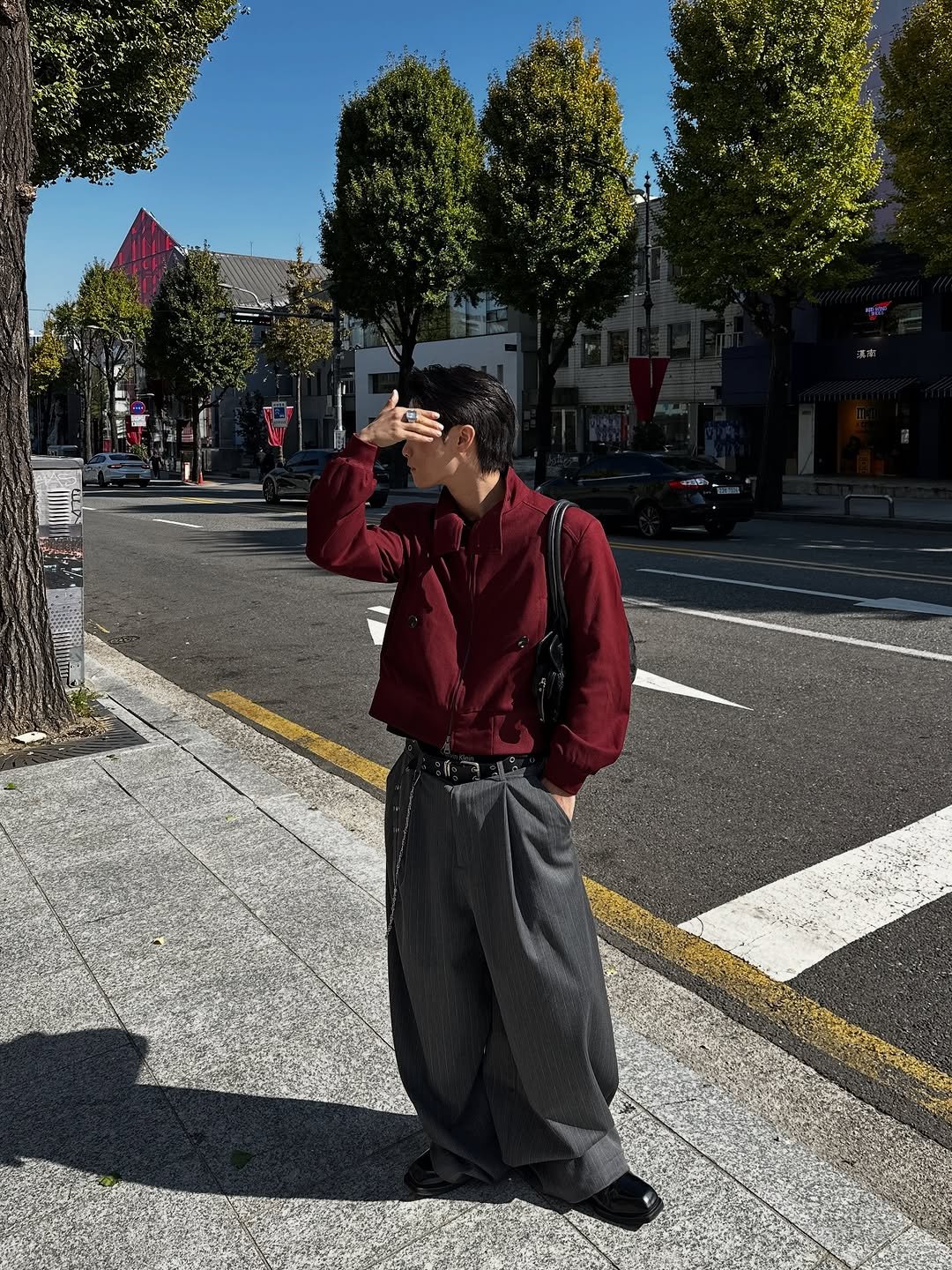 Photo shared by 라오라오 on October 28, 2025 tagging @justchawoo, and @hiddenbehind_seoul. May be an image of cigarette, street, road, curb and text.