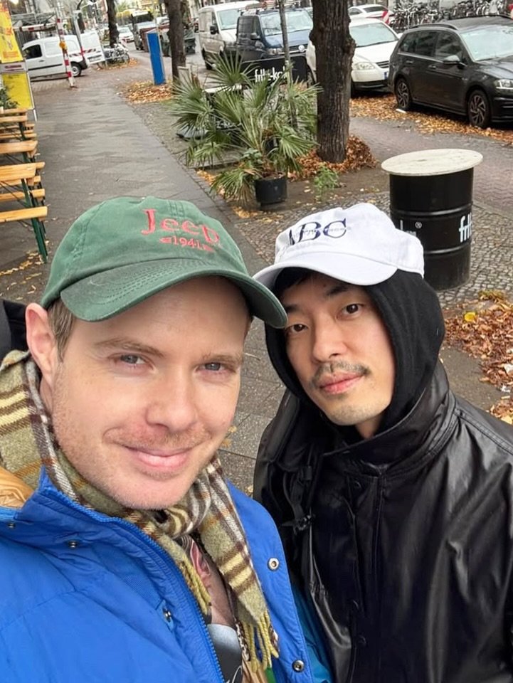 Photo shared by Moonsick Gang on November 01, 2025 tagging @johannesbreyerr. May be a selfie of one or more people, duffle coat, hat, parka, umbrella and text.