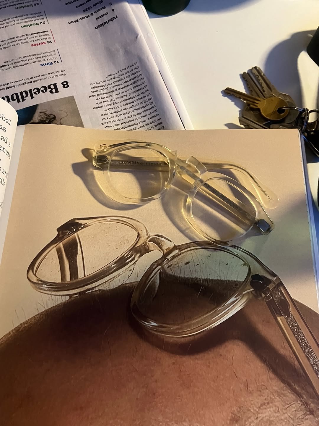 Photo shared by Moonsick Gang on December 23, 2025 tagging @martens__martens. May be an image of newspaper, sunglasses, glasses and text.