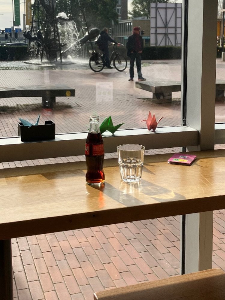 Photo by Moonsick Gang on October 20, 2025. May be an image of umbrella, street, fountain and text.