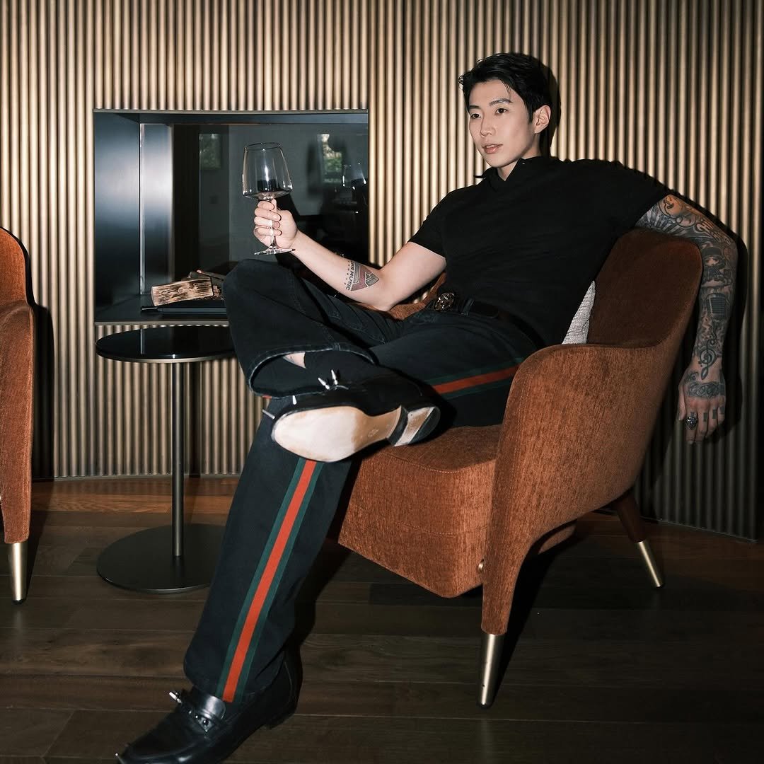 Photo shared by Jay Park (박재범) 🇰🇷 on March 02, 2026 tagging @gucci, and @demna. May be an image of sweatpants, bolo tie and text.