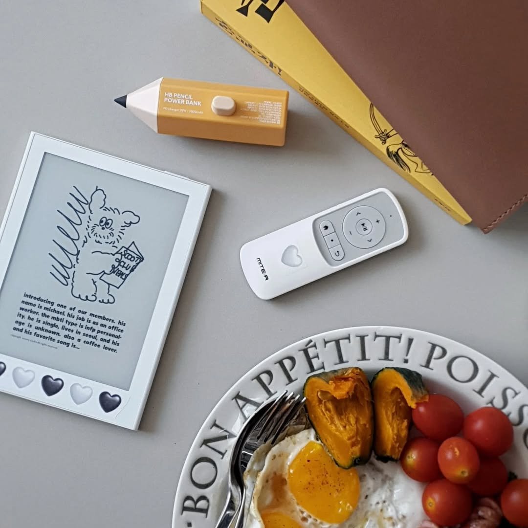 Photo shared by 아침서가 on July 23, 2025 tagging @miter_korea, @yes24_official, and @composition_studio_kr. May be an image of egg yolk, diary, stapler, placemat, boiled egg, scrambled eggs, clipboard, pencil case and text.