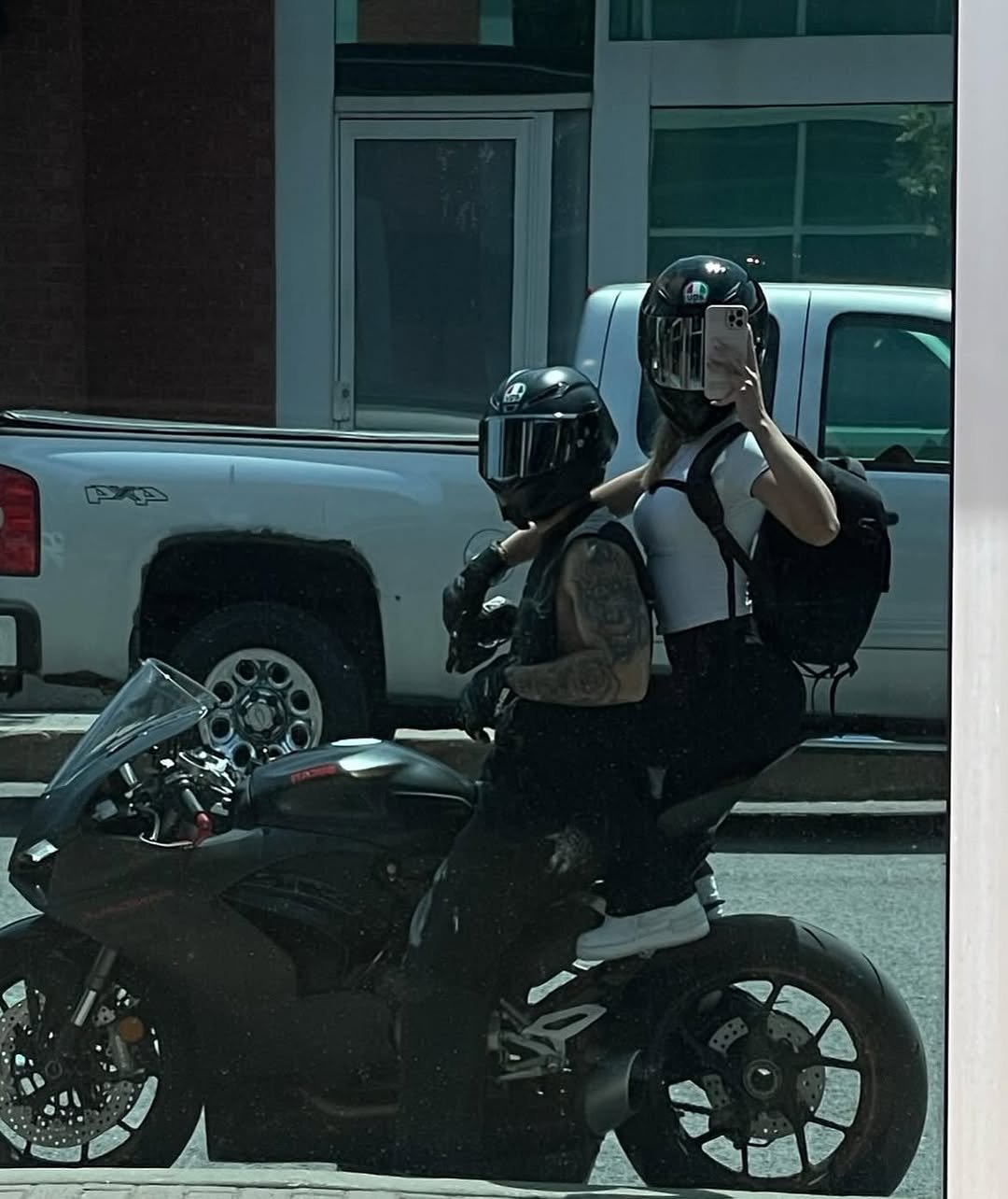 Photo by ❥ on August 07, 2025. May be an image of 1 person, motorcycle, helmet, glasses, scooter and text.