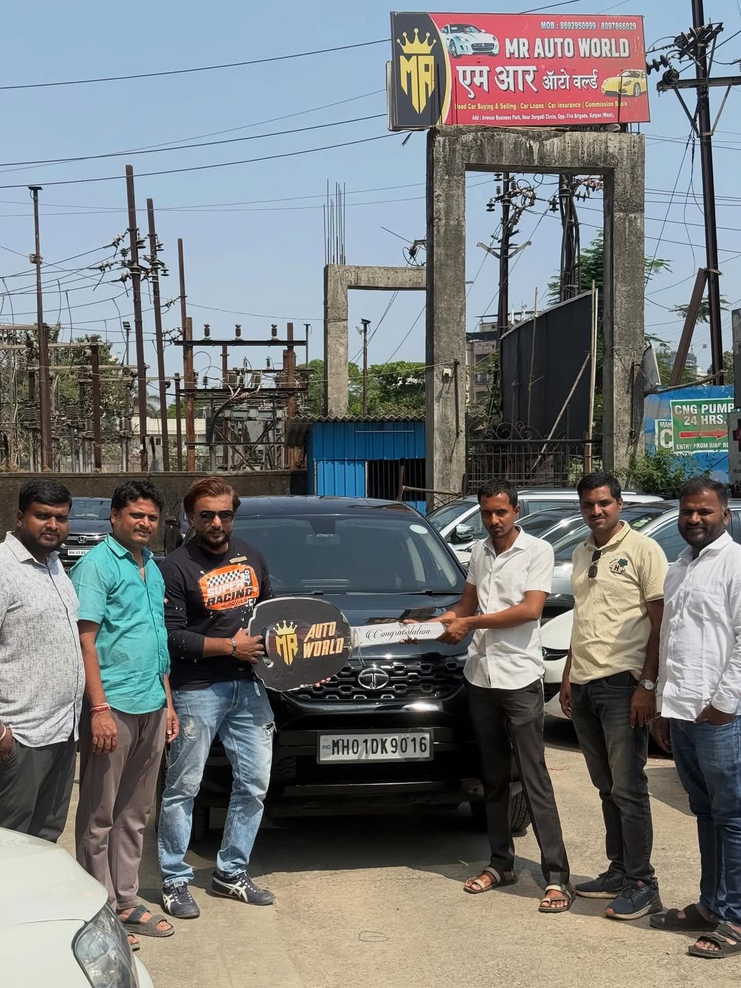 Photo by Fayyaz Memon on February 22, 2026. May be an image of standing, jeep, sedan, road and text.