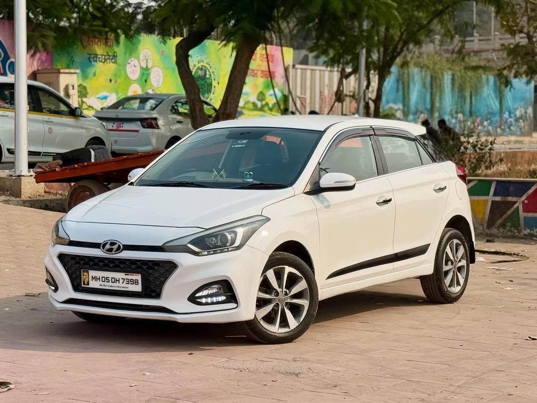 Photo by Fayyaz Memon on February 19, 2026. May be an image of wheel, sedan, road and text.