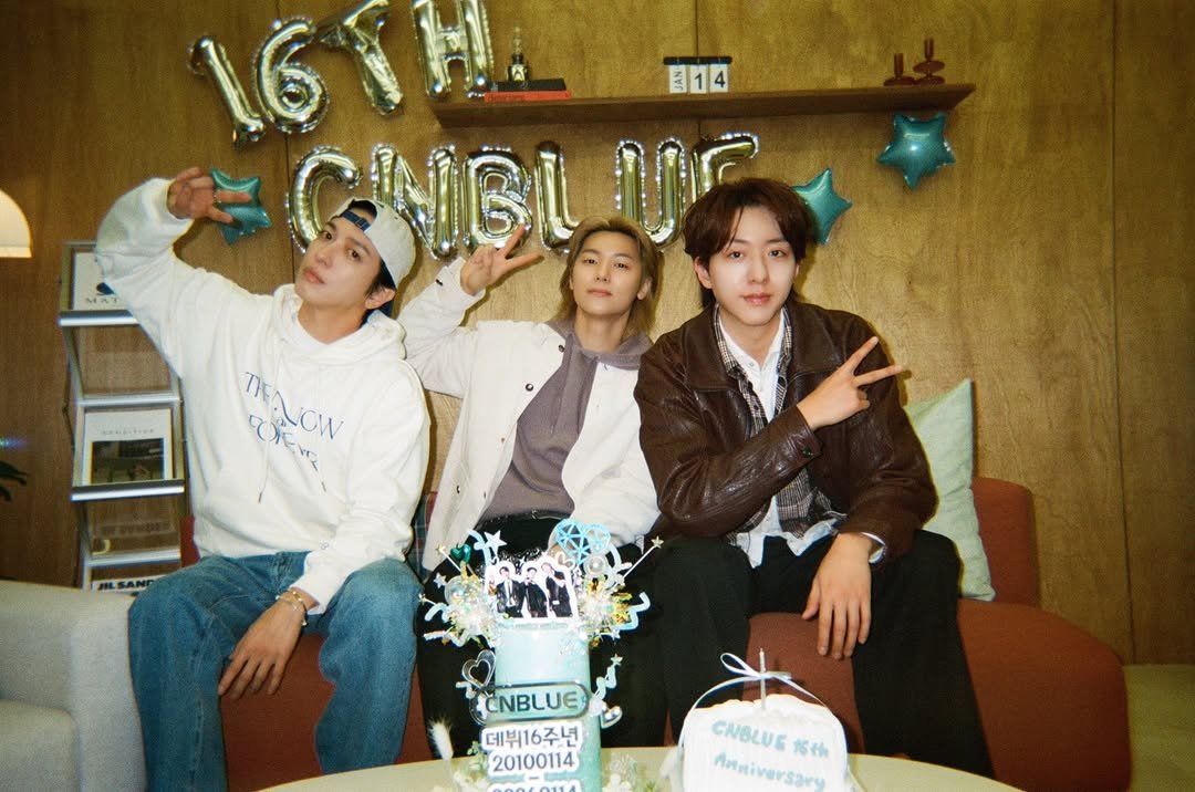 Photo shared by CNBLUE OFFICIAL on January 15, 2026 tagging @mr_kanggun, @leejungshin91, and @jyheffect0622. May be an image of ‎one or more people, bangs, bolo tie and ‎text that says '‎16 E14 GNGL لالي THALOW EW الأ ILSANI CNBLUE 데뷔16주년 20100114 CNBLUE1S CABLUE Anmiversars 16th‎'‎‎.