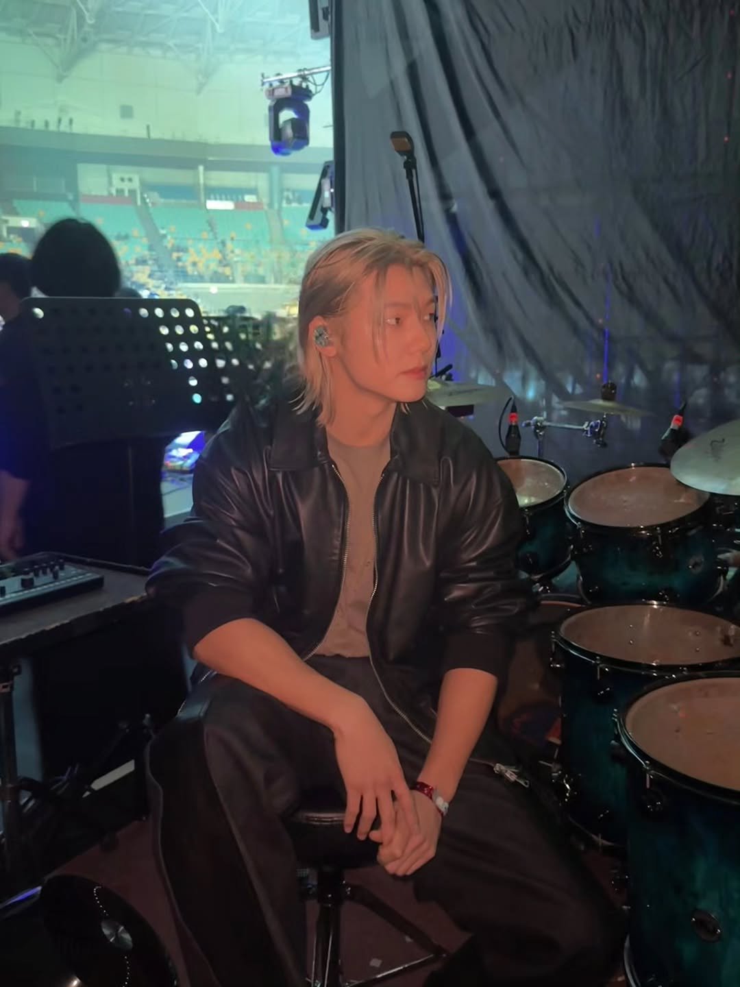 Photo shared by 강민혁 KANG MIN HYUK on October 19, 2025 tagging @grandmintfestival. May be an image of drumstick, concert and text.