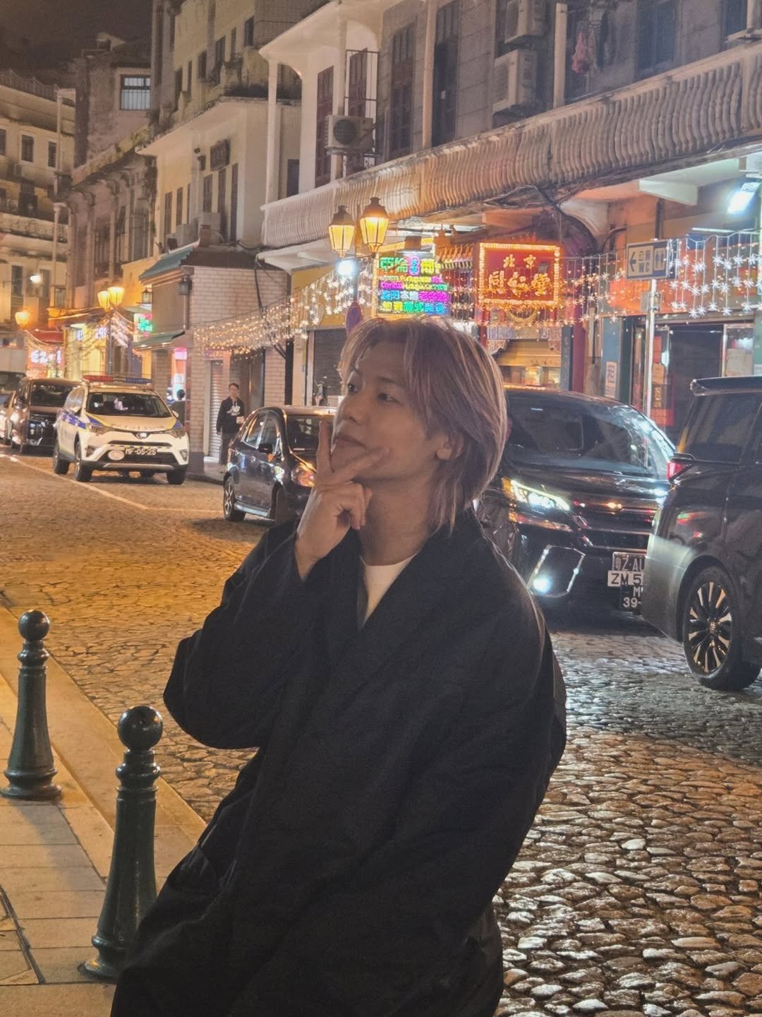 Photo by 강민혁 KANG MIN HYUK on January 30, 2026. May be an image of duffle coat, night and text.