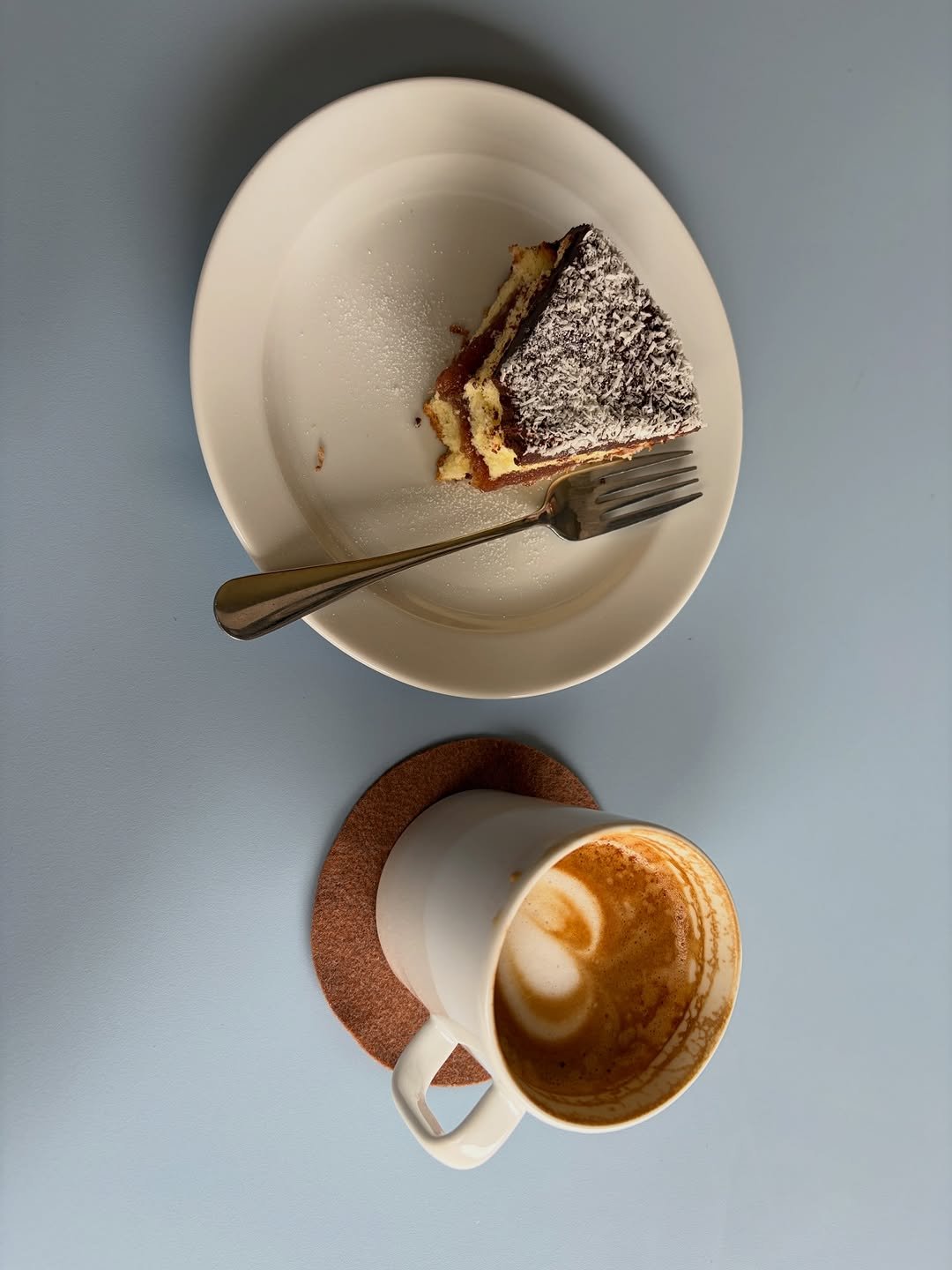 Photo by 무과수 MUGUASU on April 21, 2026. May be an image of tart, coffee cup, cake, coffee, cappuccino, tiramisu, pie and text.