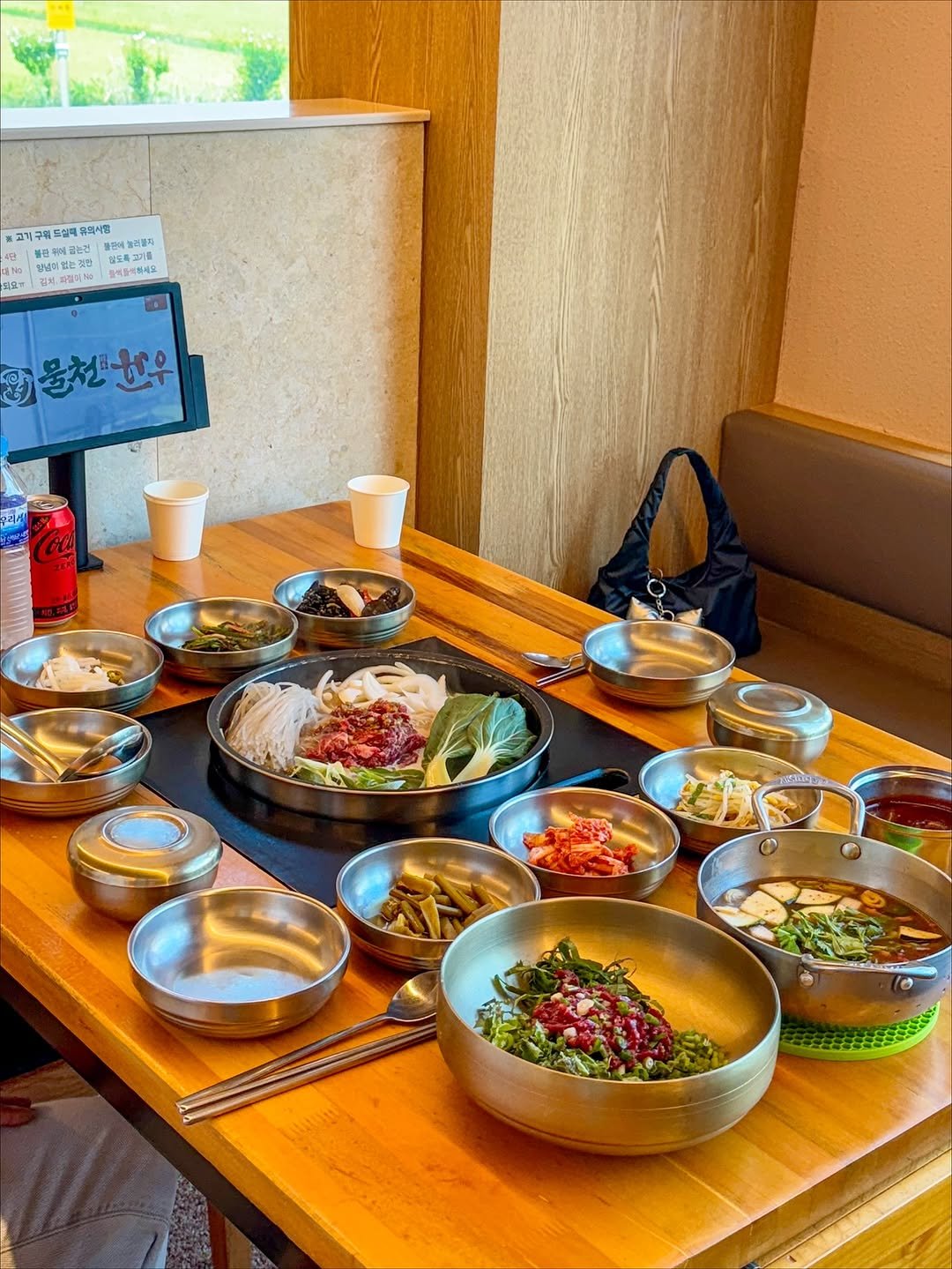 Photo shared by 셩이트 on September 22, 2025 tagging @mulcheonhanwoo. May be an image of hot pot, ramen, vegetable, buffet and text.