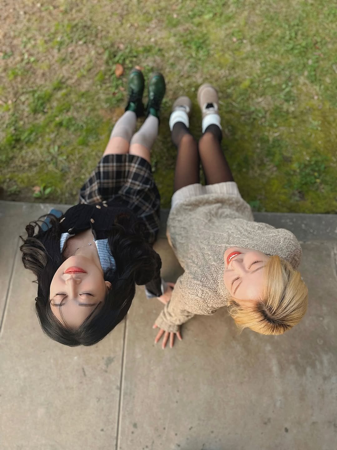 Photo shared by Kim Mumu on November 07, 2025 tagging @yx_ni_02. May be an image of turtleneck, kilt, fishnet stockings and text.