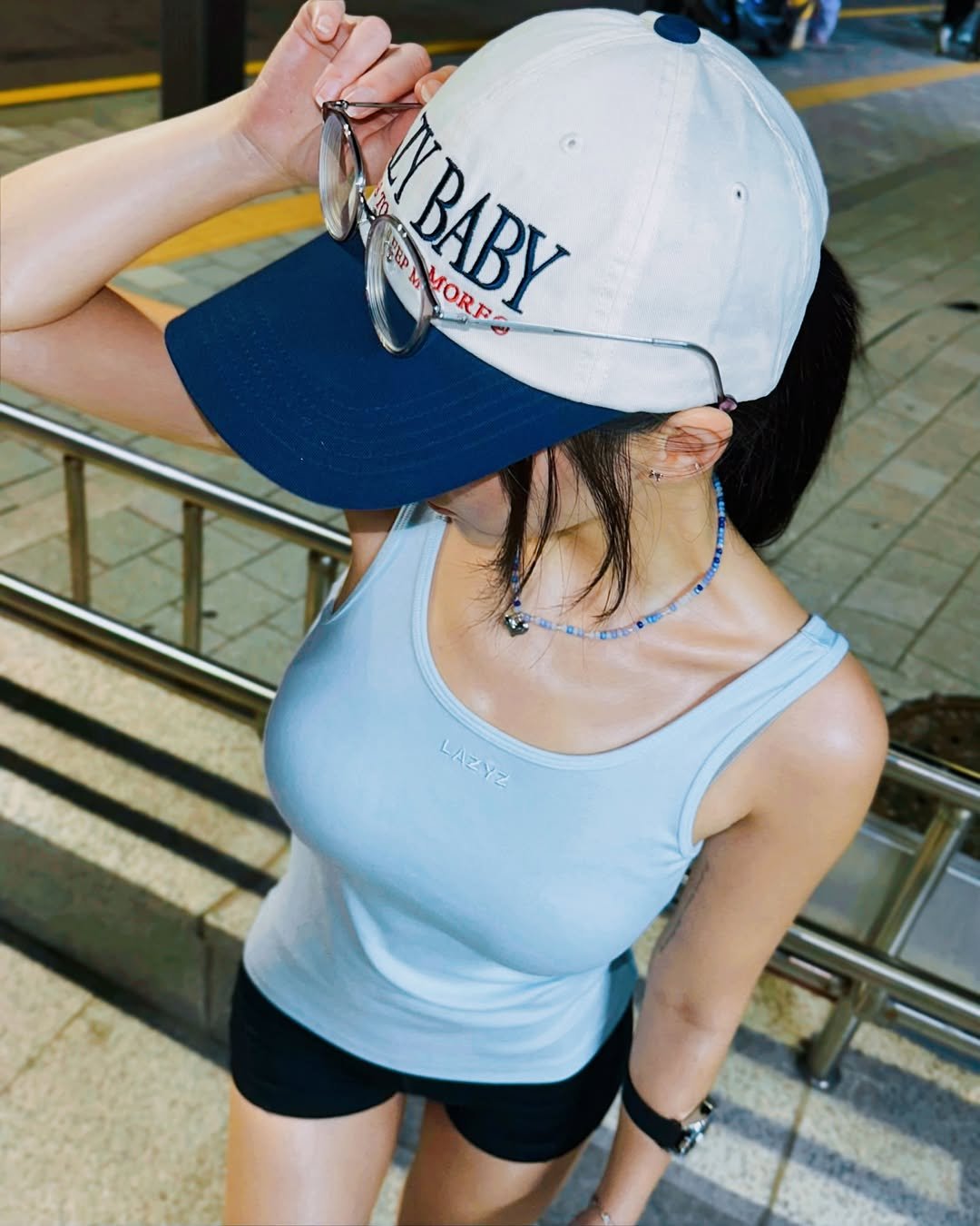 Photo shared by Kim Mumu on September 29, 2025 tagging @southsoundsori, and @lazyz.official. May be an image of 1 person, hat, top and text that says 'TYBABY i0 TO टે 4EEP PLMORE MORF LAZYZ LAZYZ'.