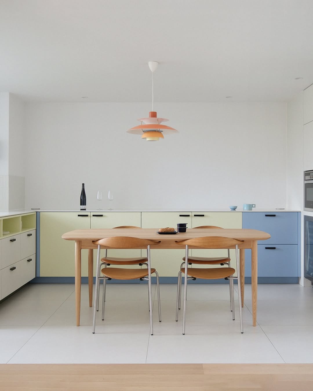 Photo by MMK_community on August 19, 2025. May be an image of table, dining table, kitchen table, indoors, kitchen and text.