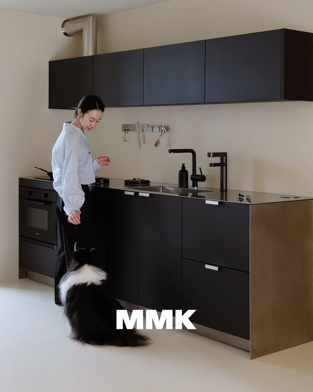Photo by MMK_community on September 21, 2025. May be an image of 1 person, dishwasher, cooker, faucet, indoors, kitchen and text.