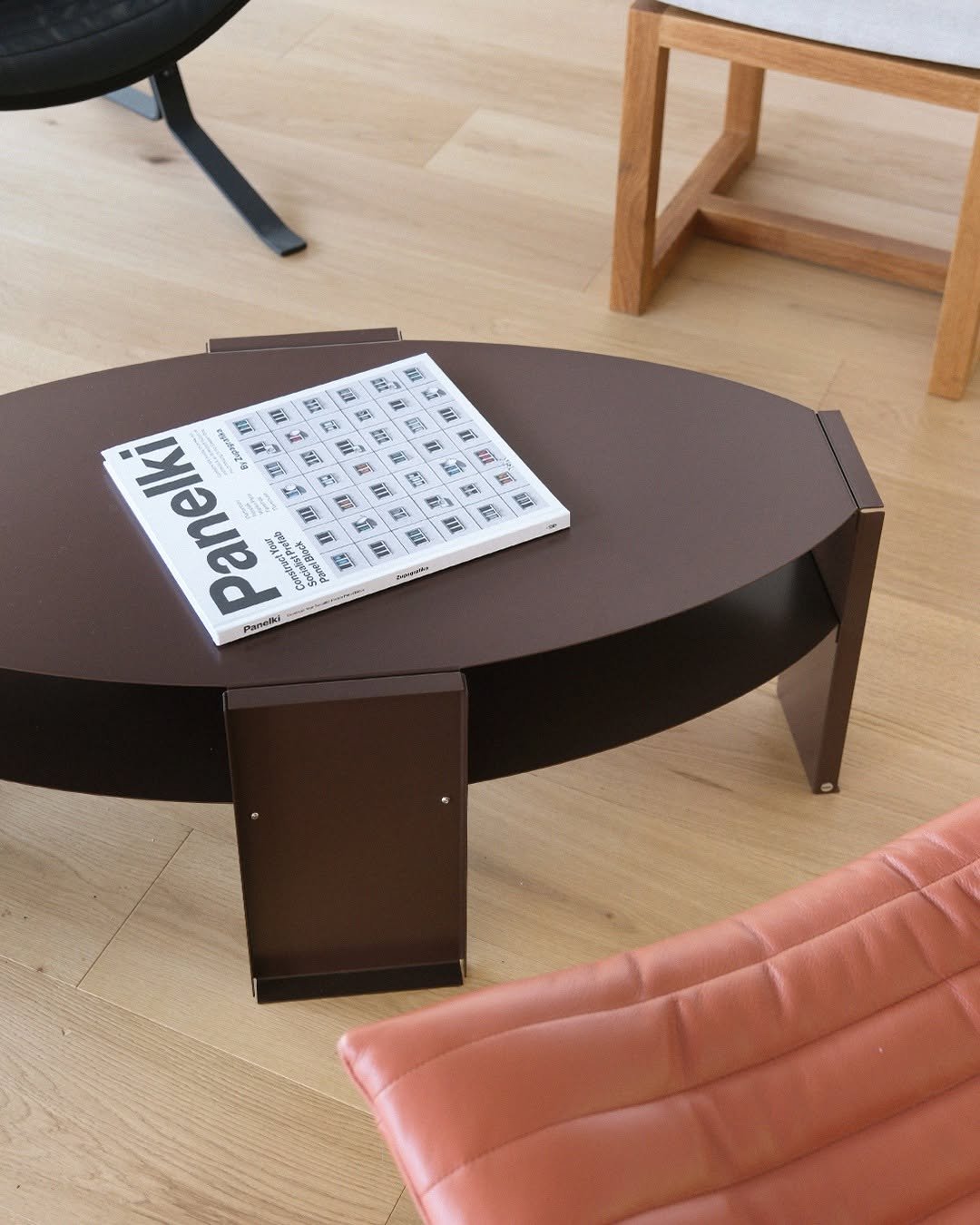 Photo by MMK_community on August 20, 2025. May be an image of table, armchair, chaise lounge, indoors and text.