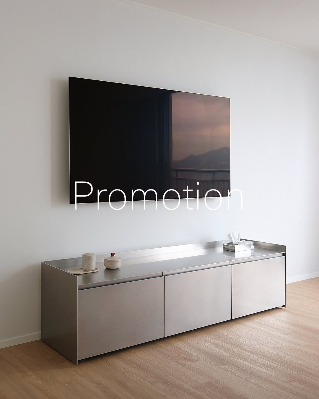 Photo by MMK_community on August 10, 2025. May be an image of television, speaker, screen, furniture, thermostat and text that says 'Promotion'.