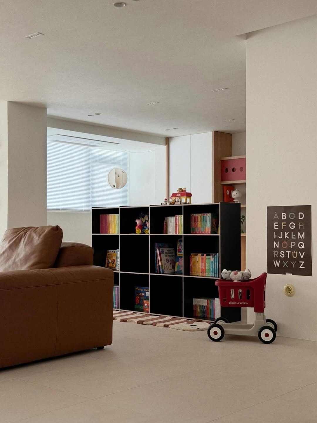 Photo by MUTOMO ART PROJECT in MUTOMO ART PROJECT. May be an image of toy, carpet, sliding door, living room, indoors and text that says 'B E EFGH E F lJKLM JKL NÓPQ N STUV WXYZ w z'.