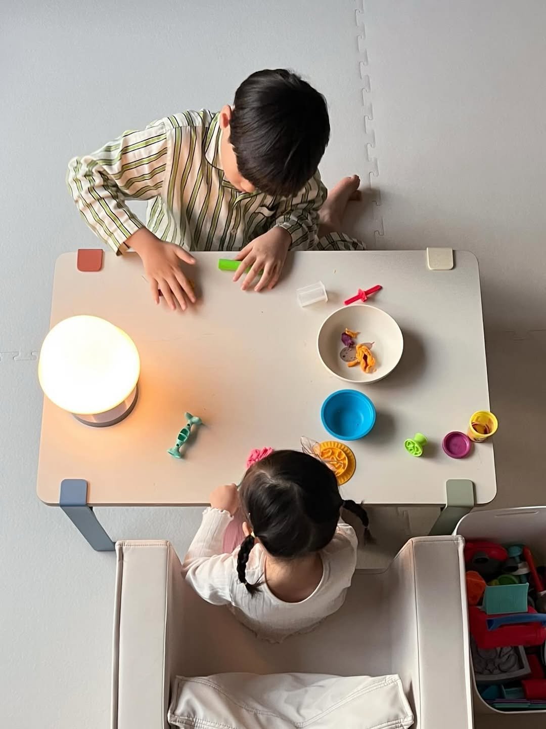 Photo by MUTOMO ART PROJECT in MUTOMO ART PROJECT. May be an image of baby, table, toy and text.