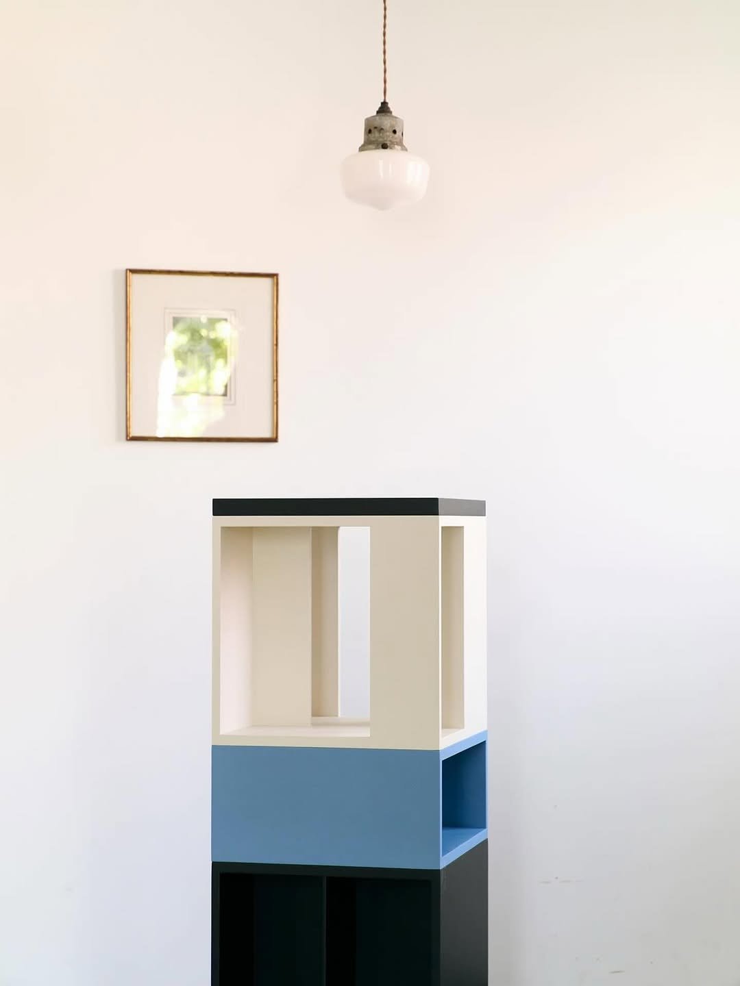 Photo by MUTOMO ART PROJECT in MUTOMO ART PROJECT. May be an image of credenza, armoire, shelf and text.