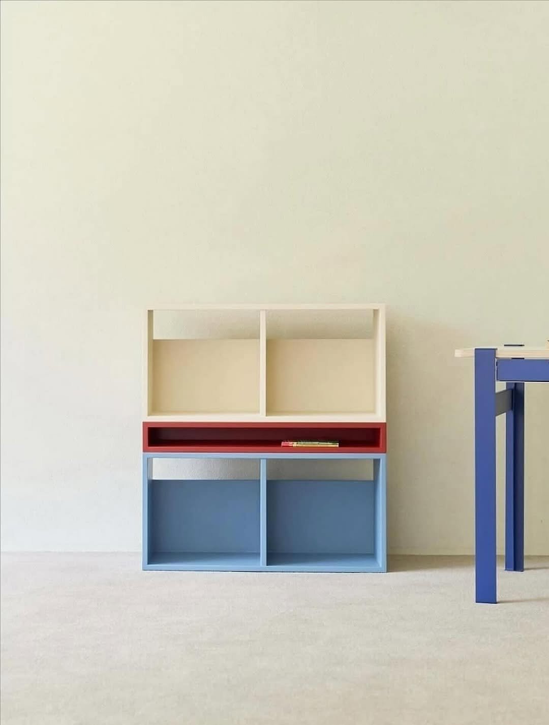 Photo by MUTOMO ART PROJECT in MUTOMO ART PROJECT. May be an image of credenza, shelf, bureau, rack and text.