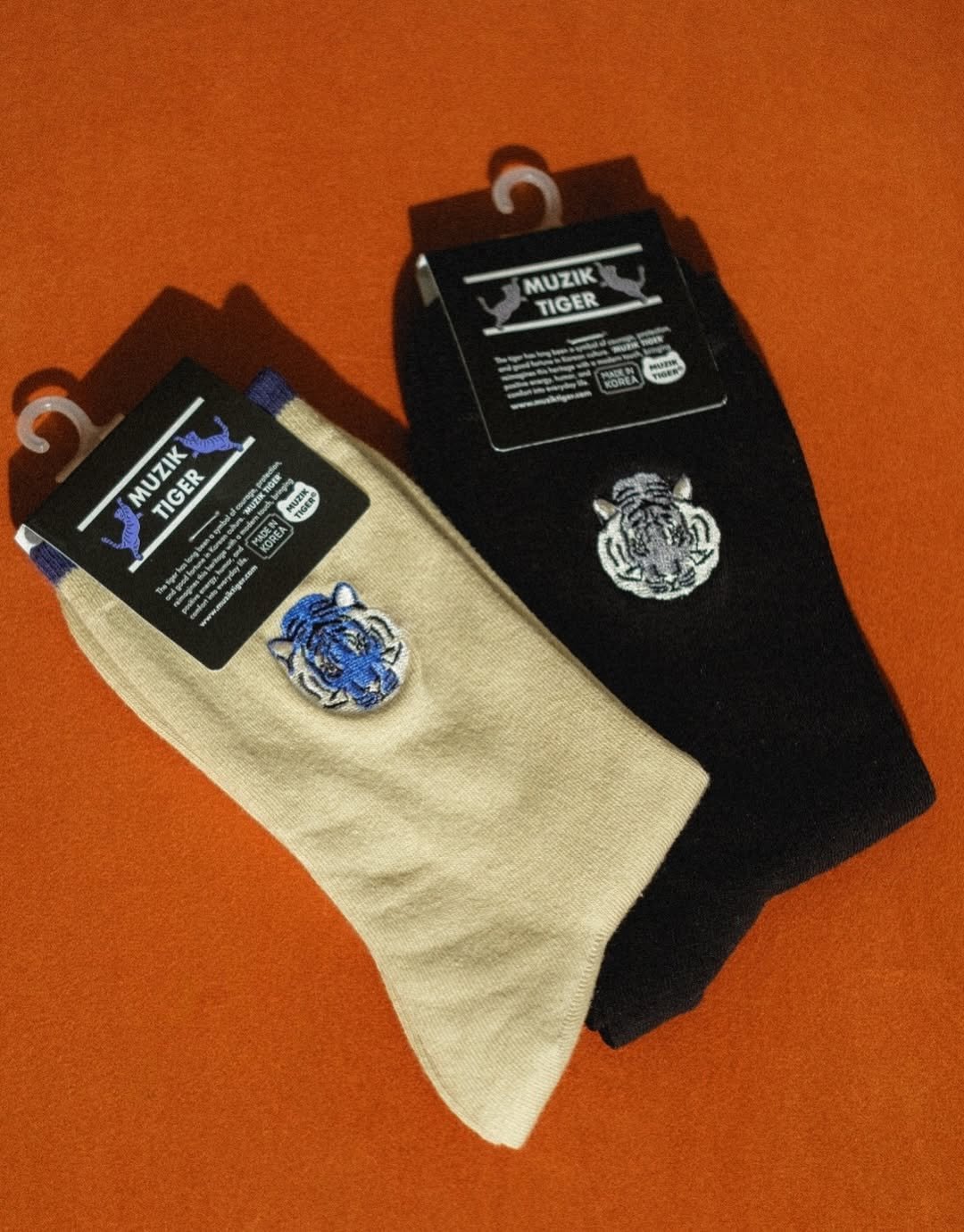 Photo shared by MUZIKTIGER 무직타이거 on November 08, 2025 tagging @muziktiger. May be an image of sock, toecap shoes and text.