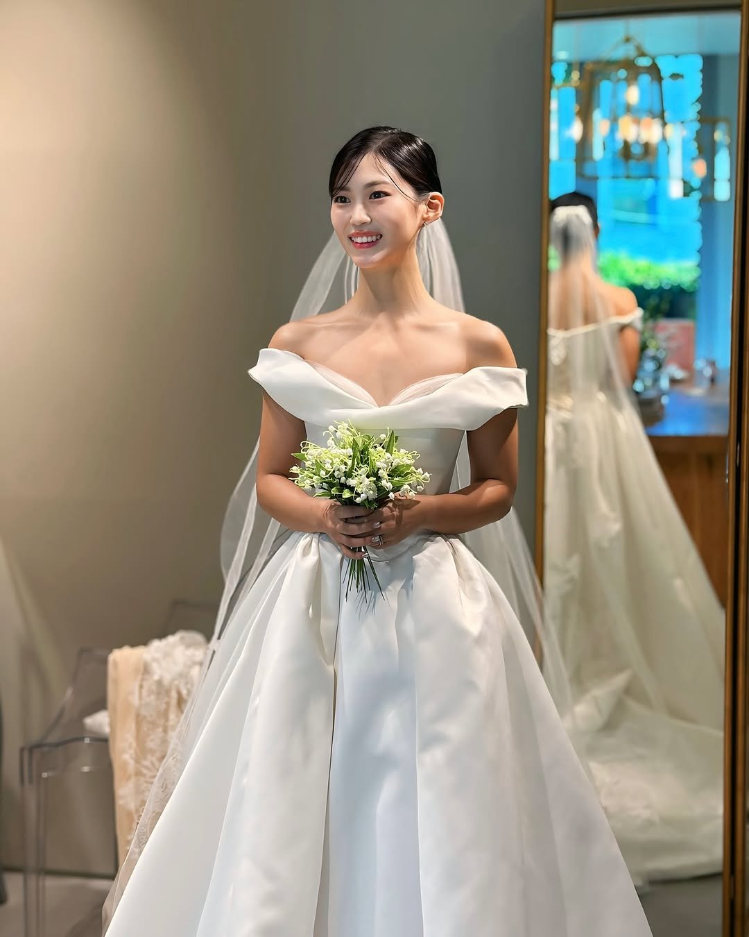Photo by 안채린 on May 16, 2025. May be an image of 1 person, wedding and text.