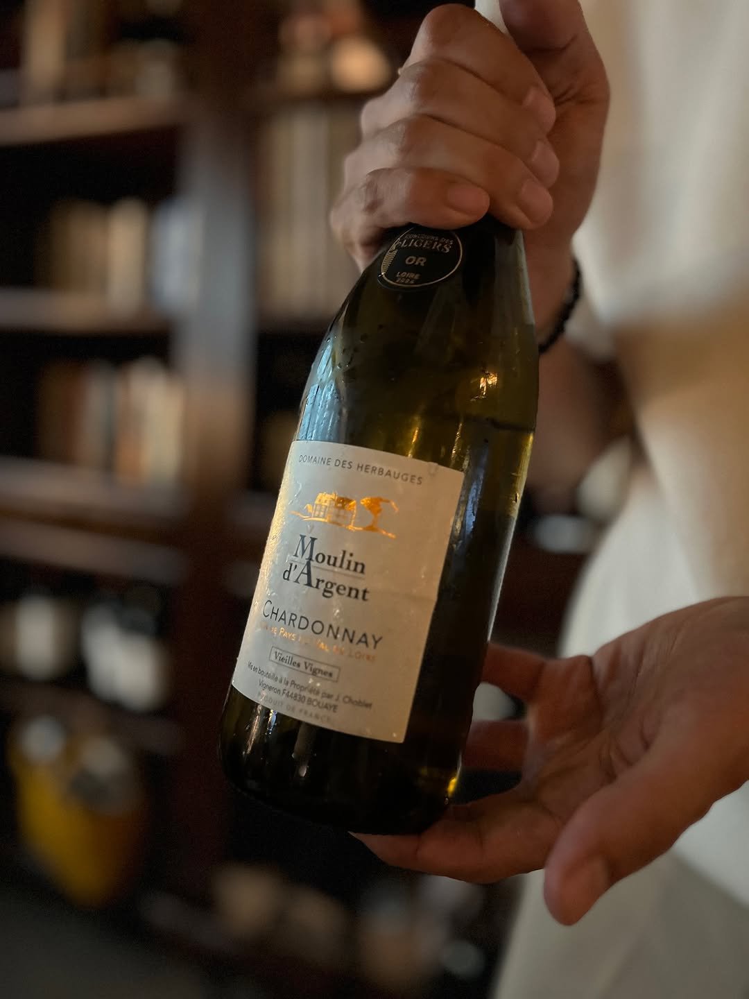 Photo by 마이리틀케이브 on July 16, 2025. May be an image of champagne and bottle.