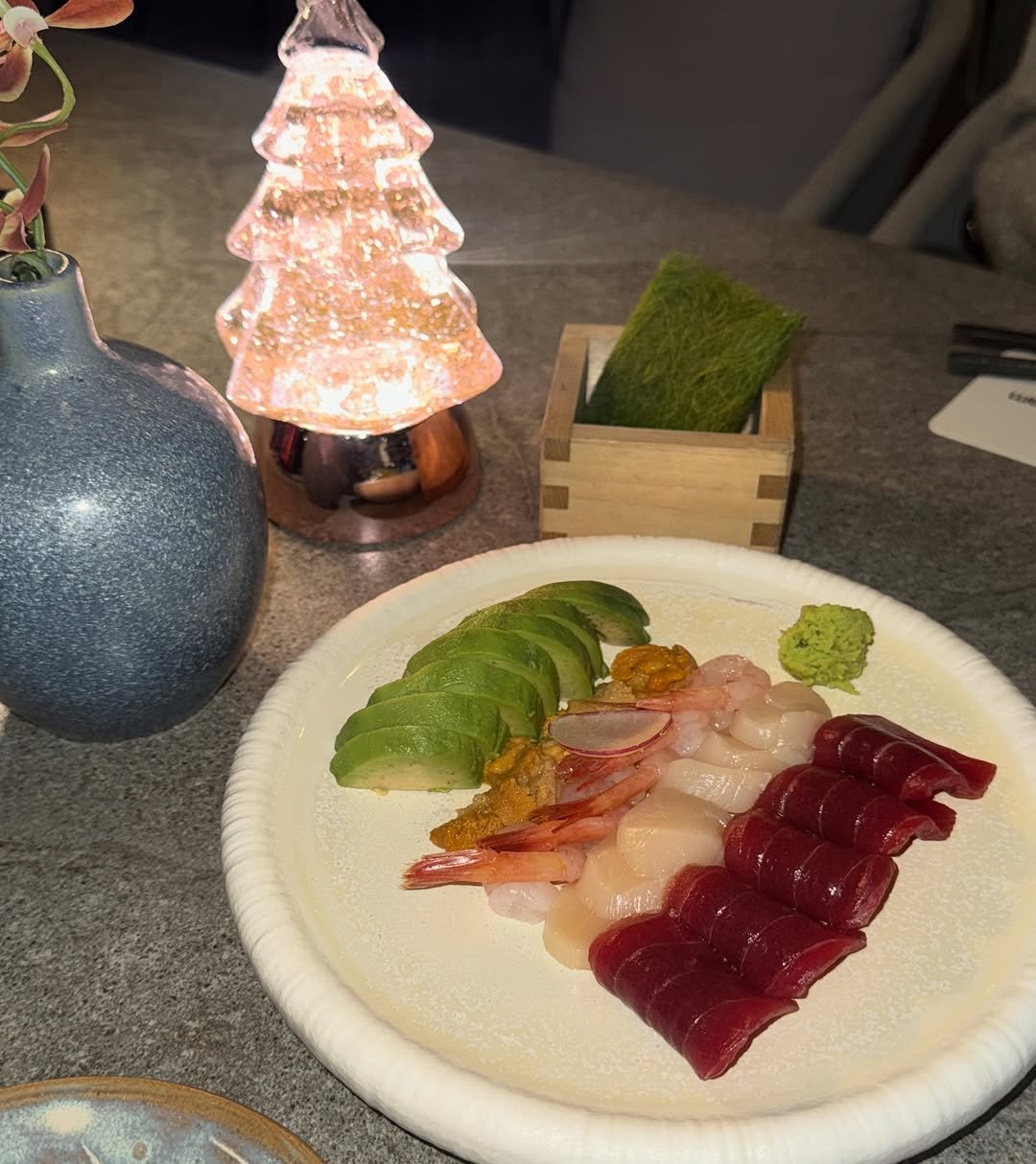 Photo by 묘정 on December 05, 2025. May be an image of sashimi, sushi and text.